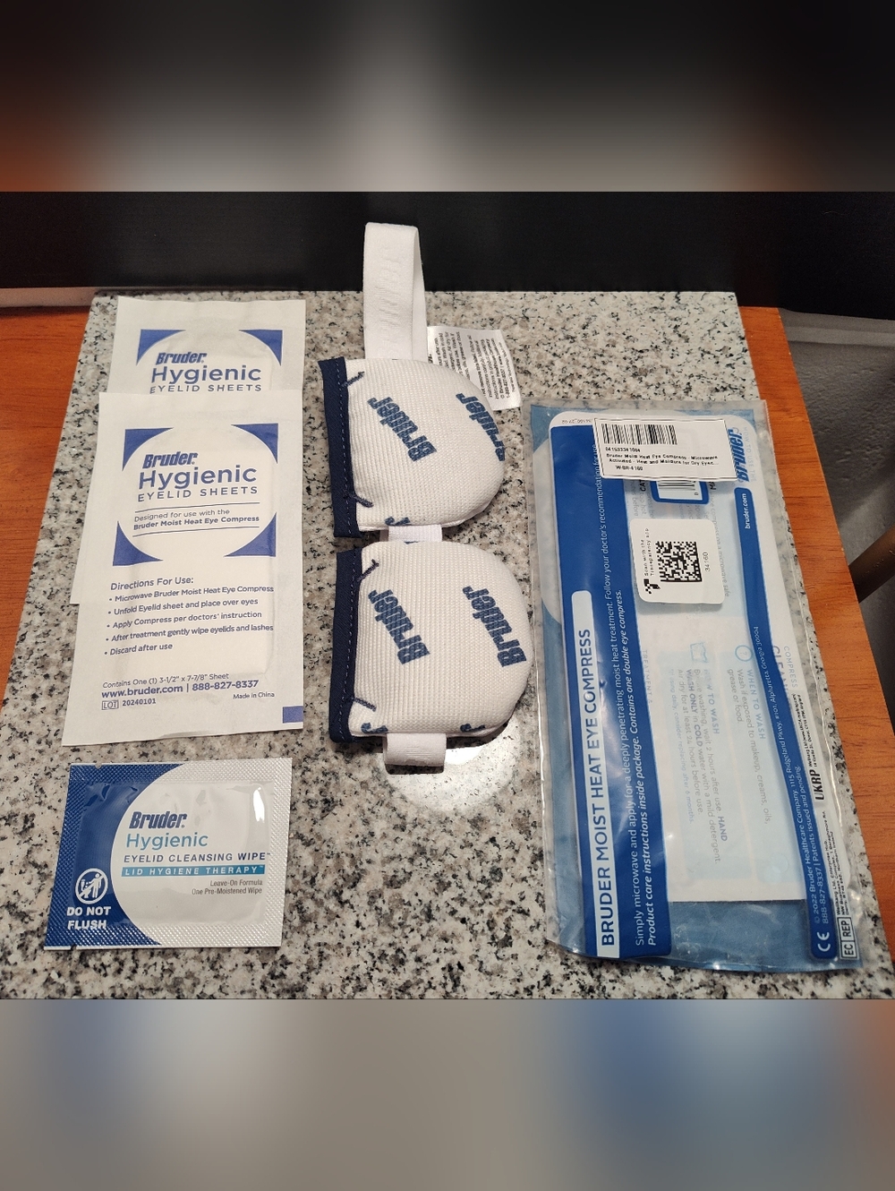 Bruder White and Navy Moist Heat Eye Compress Mask.